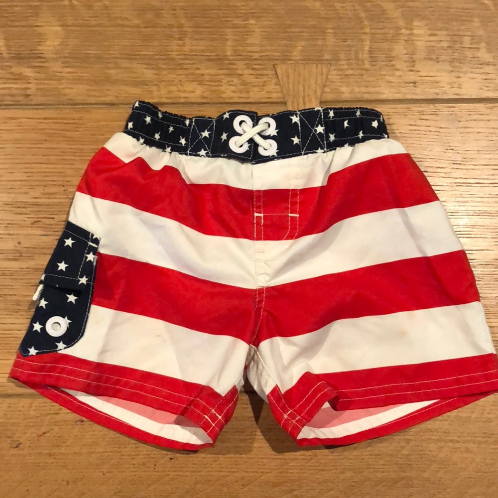 Osh Kosh B’gosh American flag bathing trunks